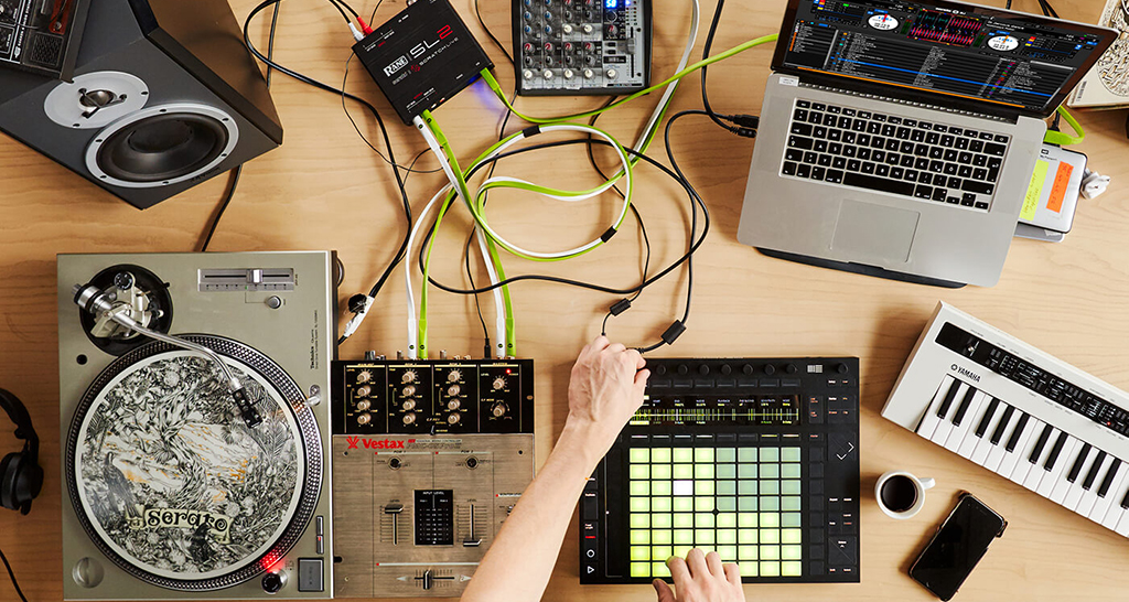 A set up where a DJ can use production equipment to Dj with